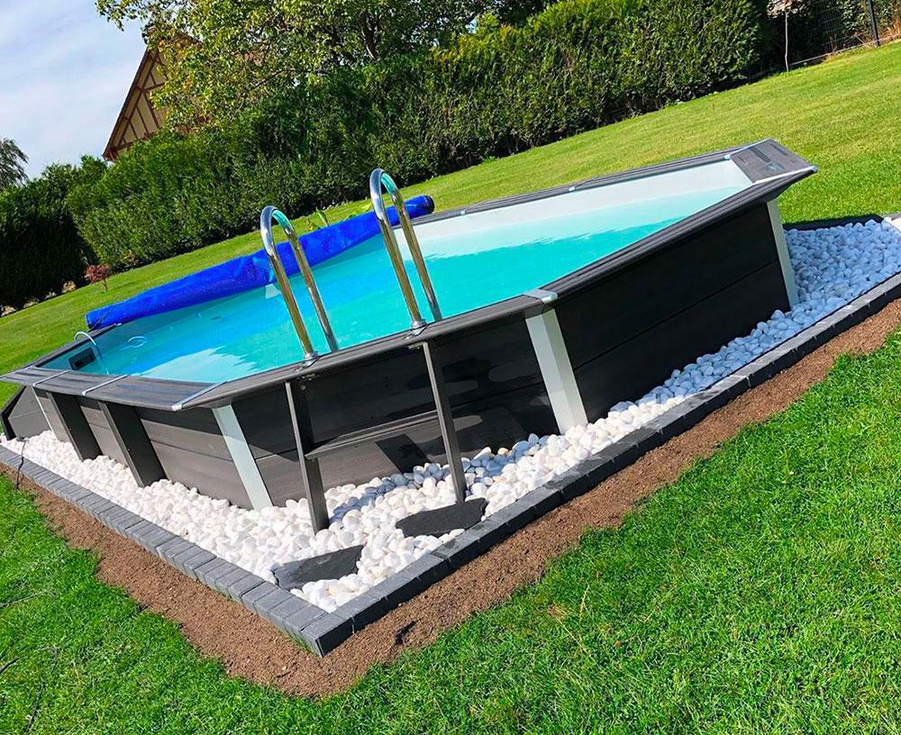 Comment installer une piscine semi-entérée composite dans votre jardin ?